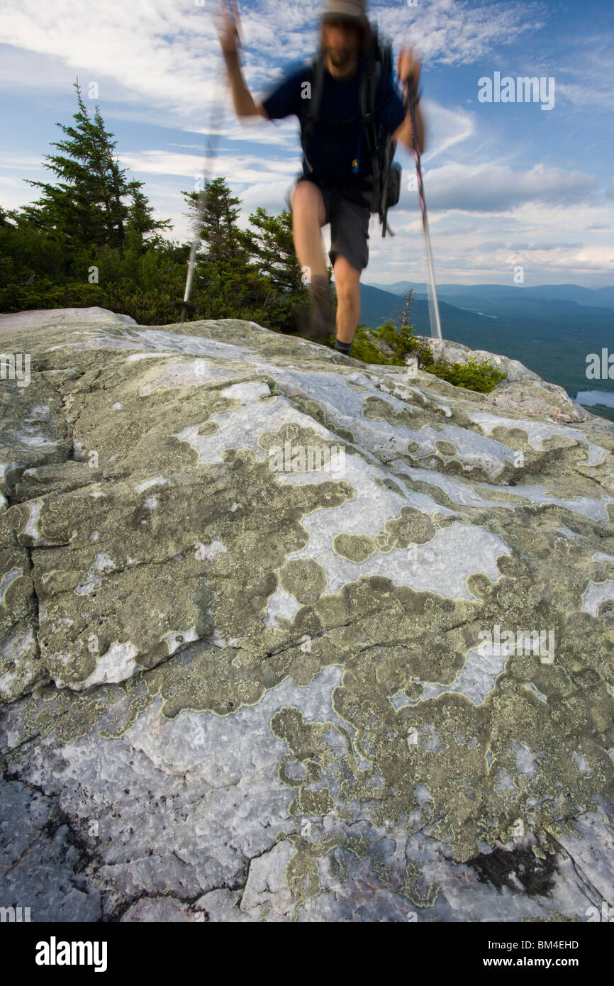 A hiker on the summit of Mount Cube in Orford, New Hampshire