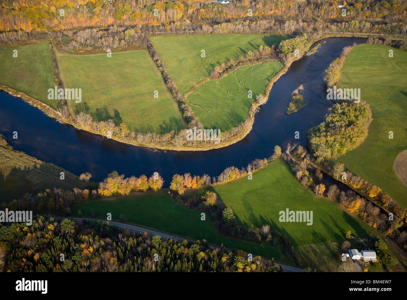 An aerial view of farms and the Connecticut River in Maidstone, Vermont and Stratford, New