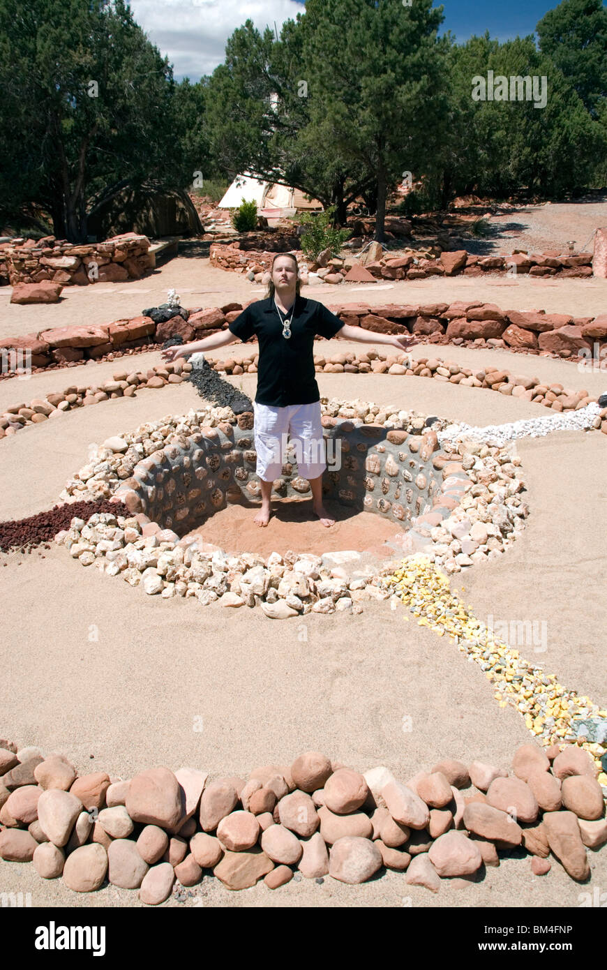 Medicine wheel shamanic circle healing earth energy vortex sacred site with psychic Brian Sedona Arizona USA Stock Photo