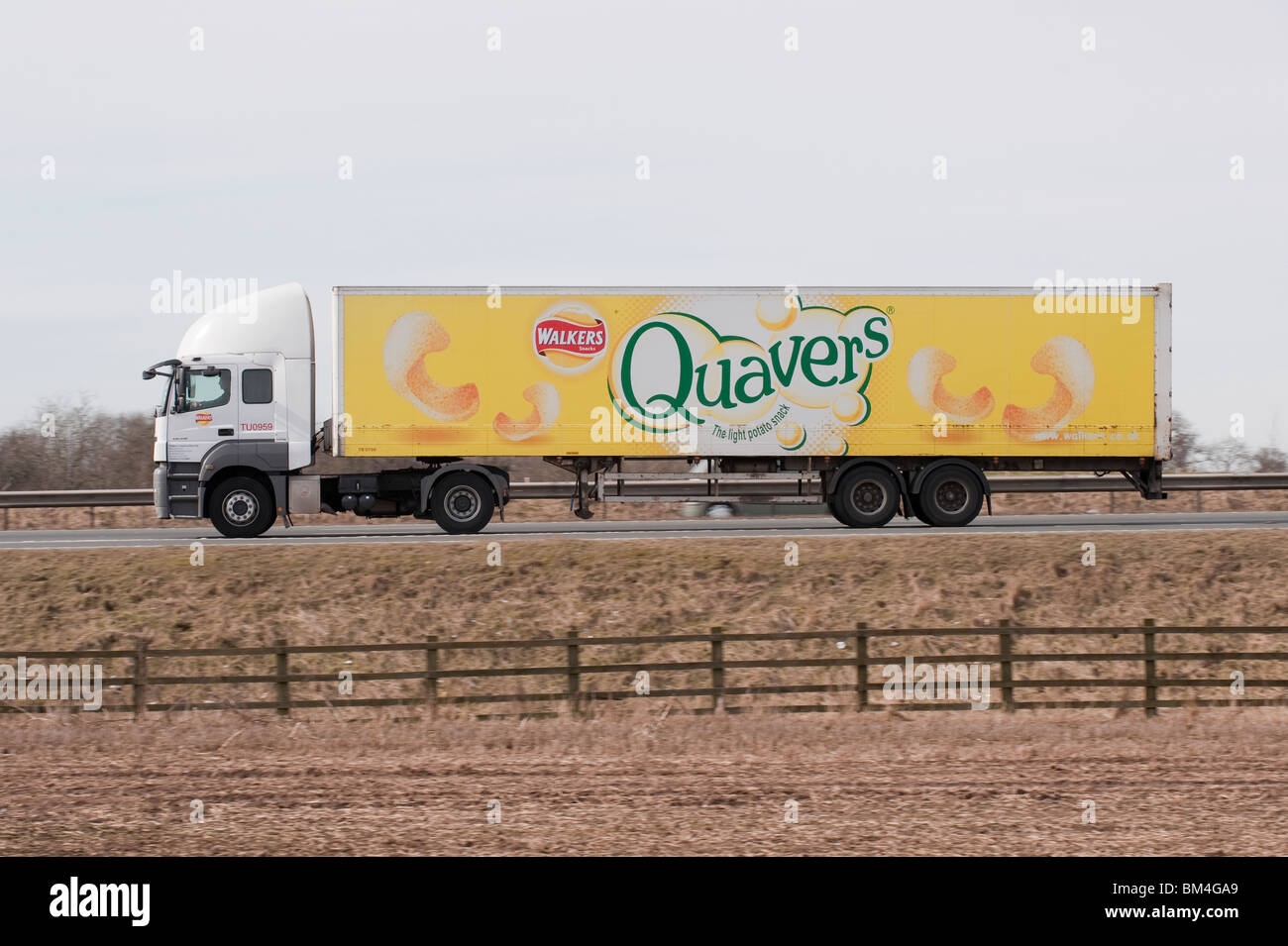 A lorry transporting goods for Walker's and promoting Quavers Stock