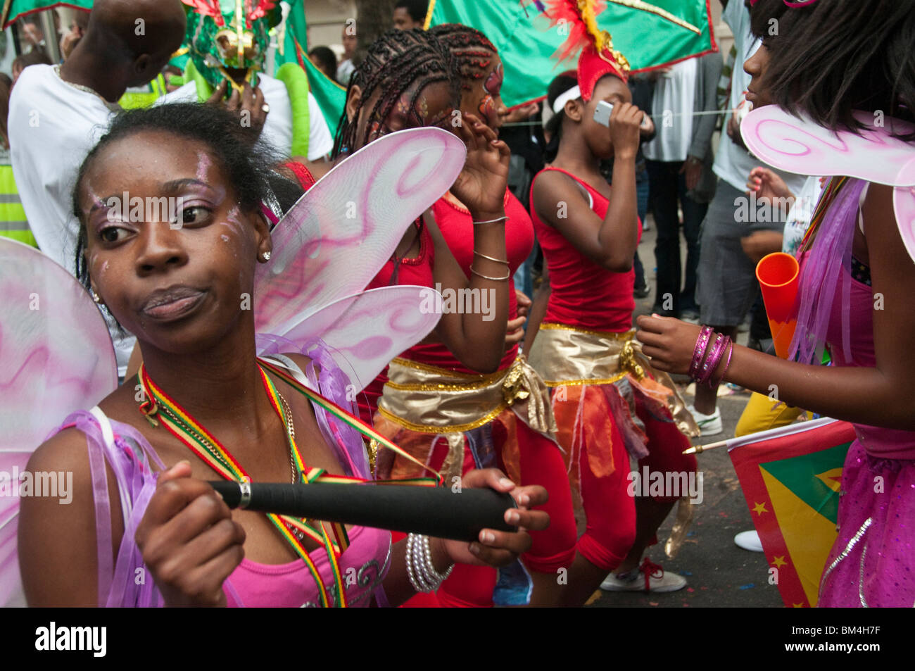 Young black Afro Caribbean girls in carnival costume - one with wings ...