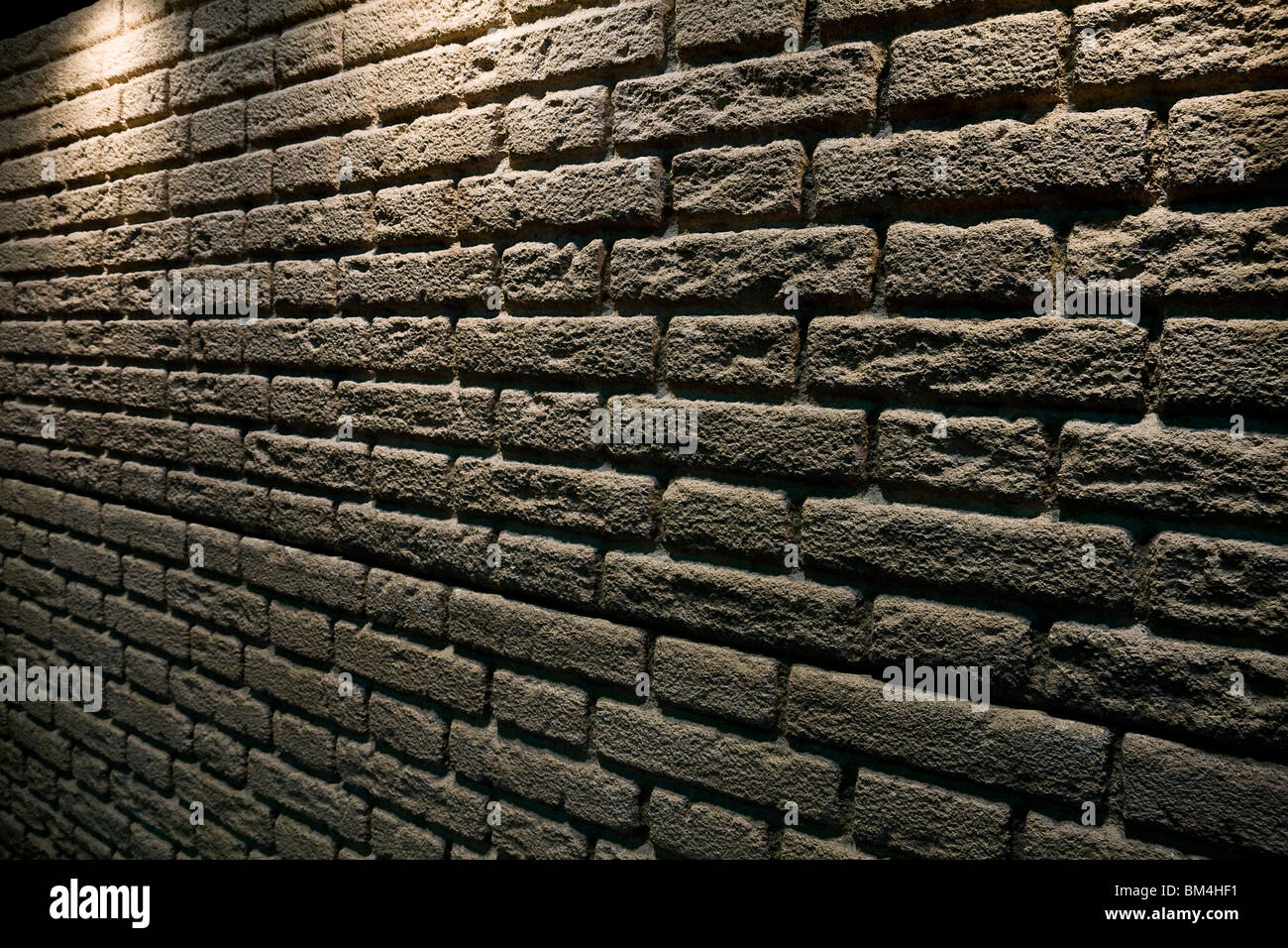 Isolated Lamp Lighting Spot On old brick wall Stock Photo