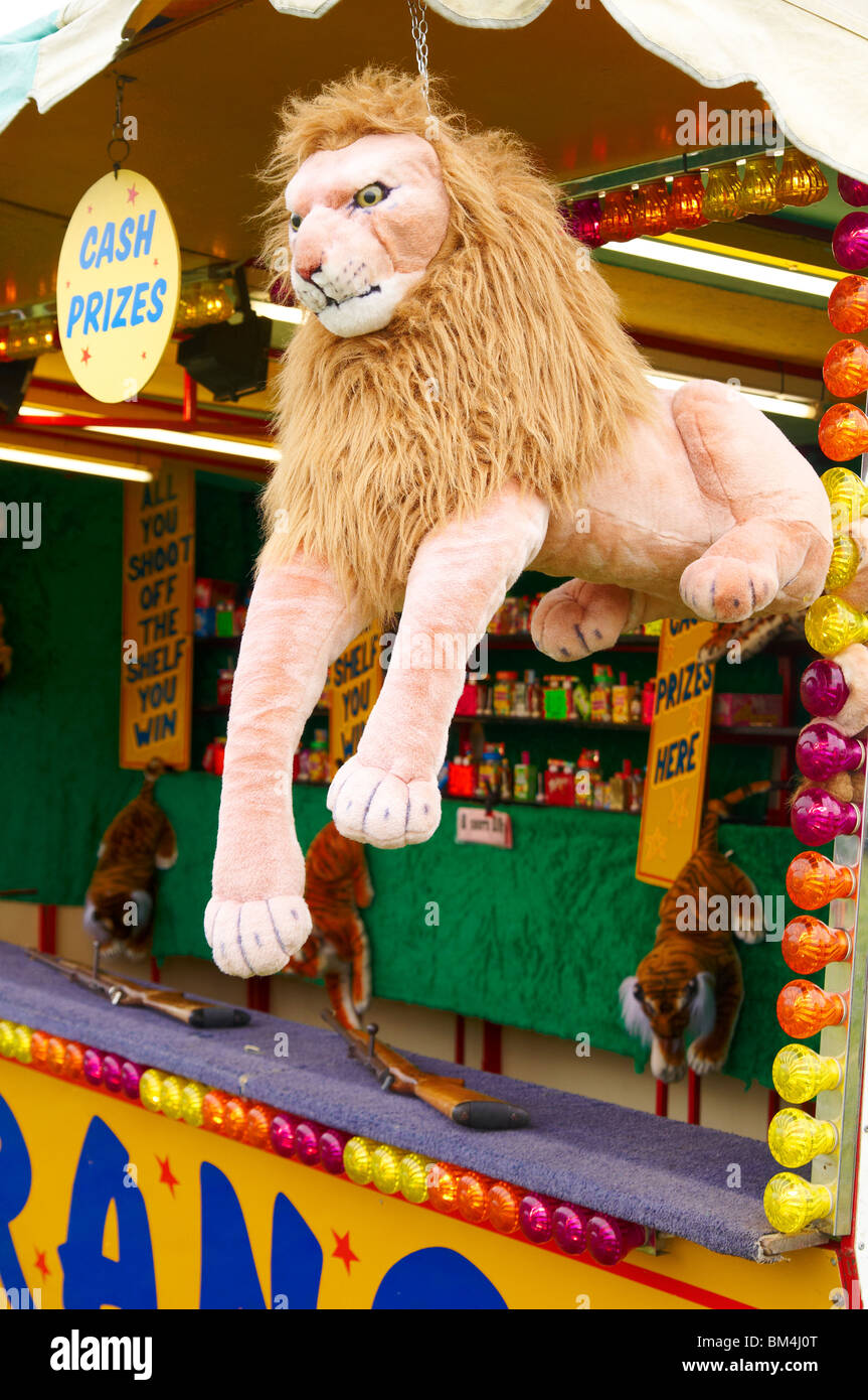 Stuffed animals - prizes at a traditional fairground shooting gallery. Stock Photo