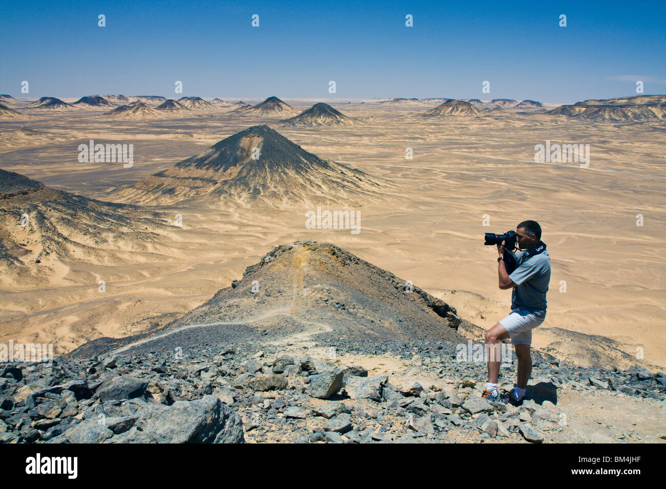 Tourist photographs Black Desert, Libyan Desert, Egypt Stock Photo