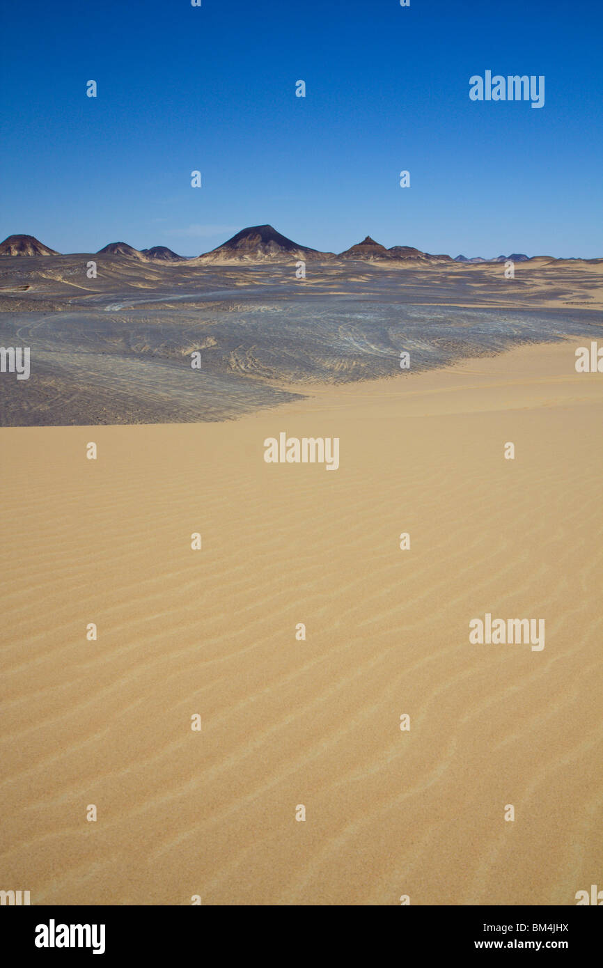 50-Meter Dune in Black Desert, Libyan Desert, Egypt Stock Photo
