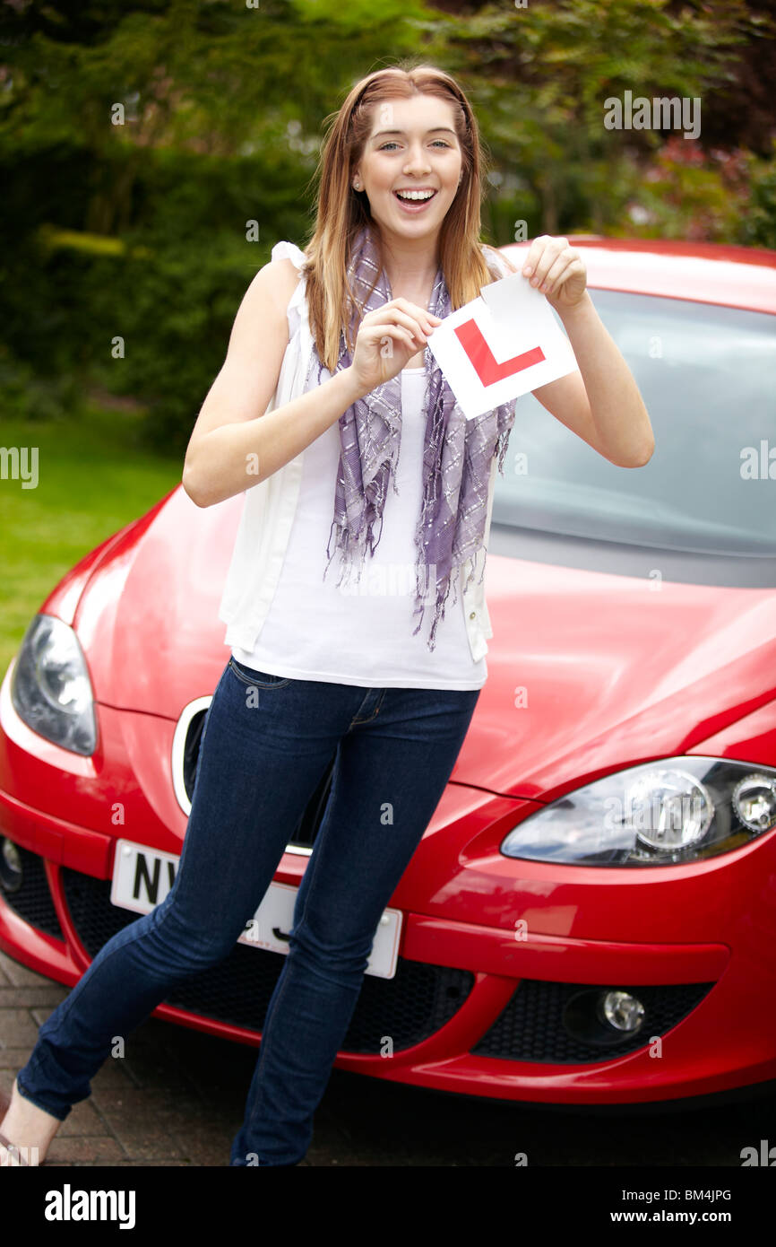 Girl just passed driving test Stock Photo