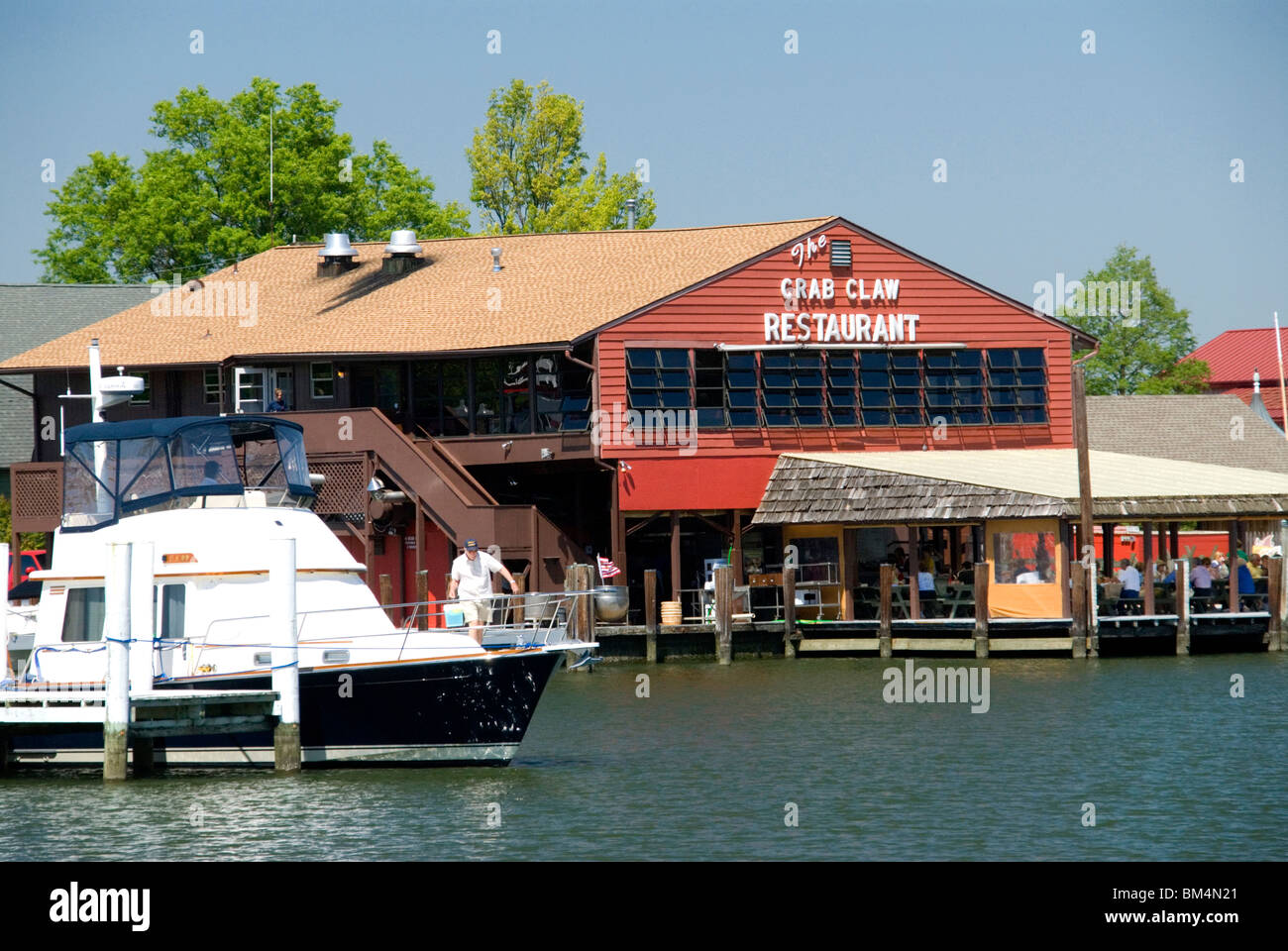 Diners eating Chesapeake Bay crabs at The Crab Claw Restaurant St