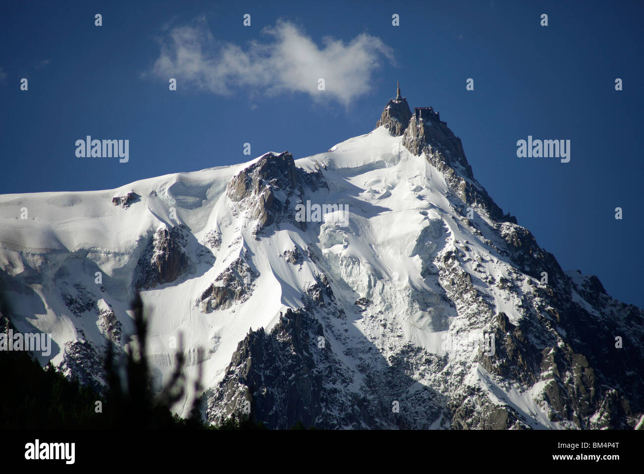 snow covered Aiguille du Midi at the Mont Blanc Massif, near Chamonix-Mont-Blanc, France, Europe Stock Photo
