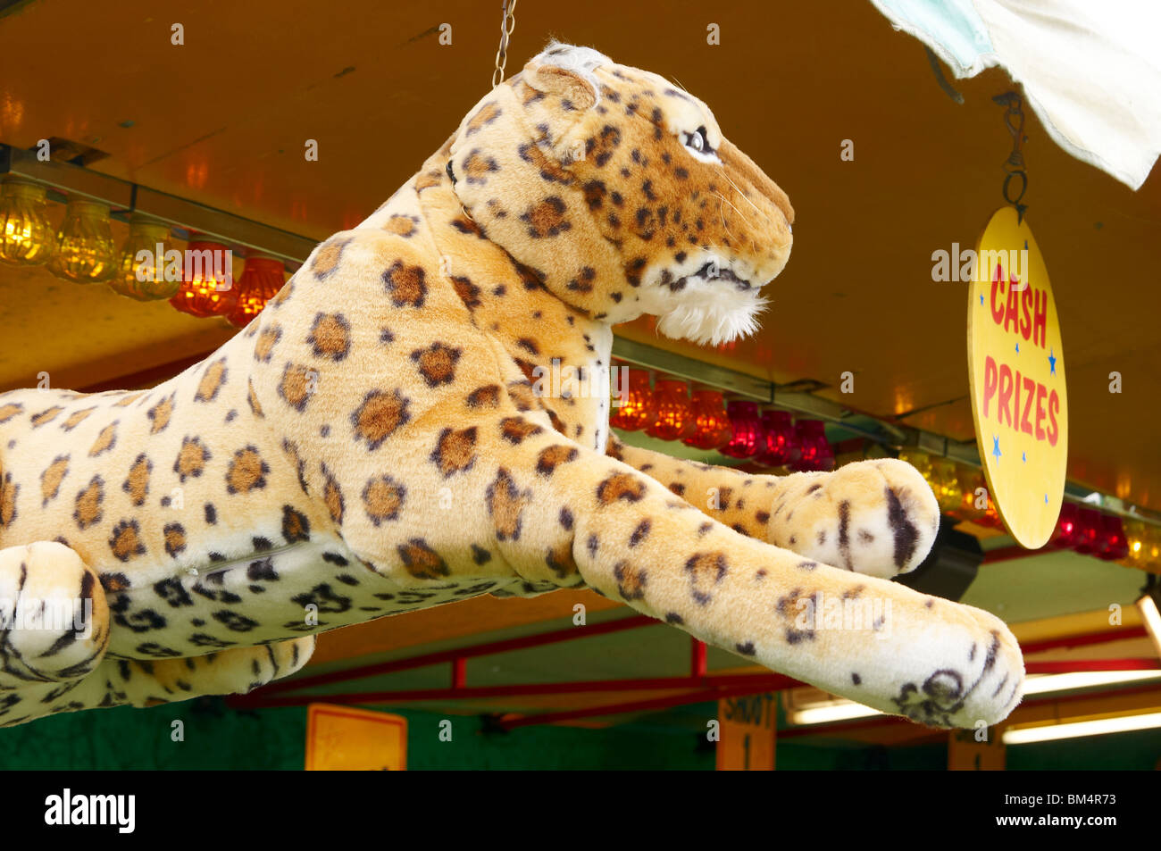 Stuffed animals - prizes at a traditional fairground shooting gallery. Stock Photo