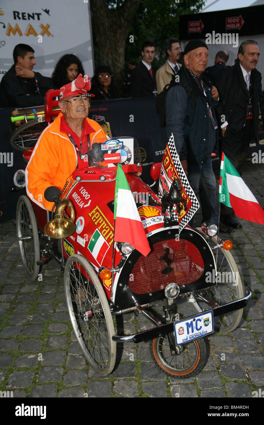 Ferrari fan in Rome during the 2010 Mille Miglia Stock Photo