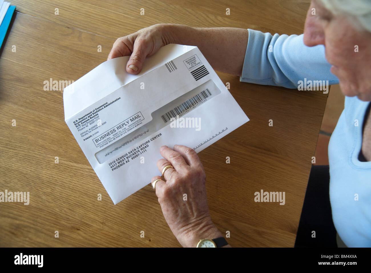 A completed 2010 U.S. Census form is ready to be mailed to the Census Bureau. Note bar code for processing. Stock Photo