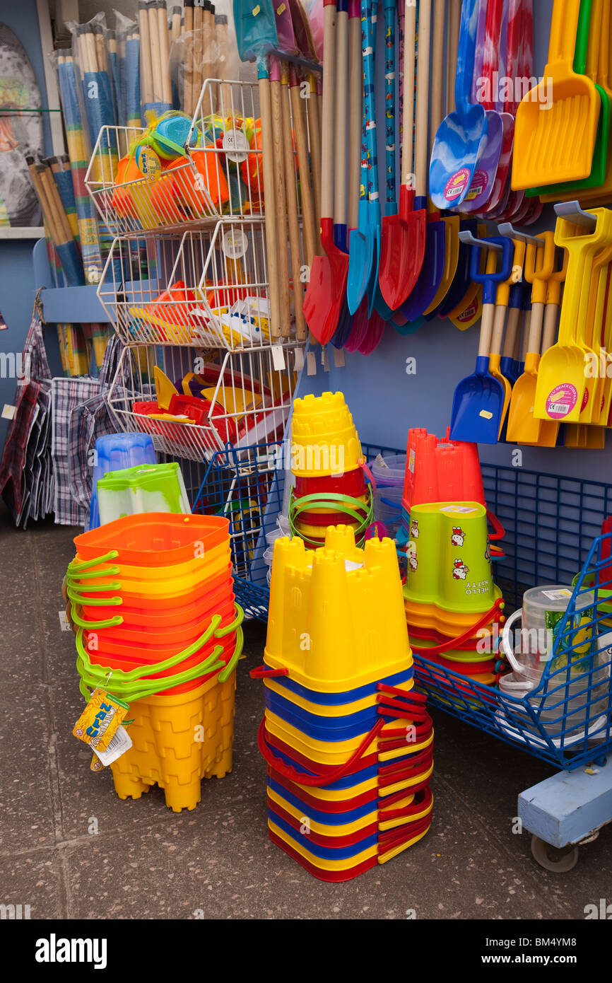 UK, England, Devon, Woolacombe, tourist economy, buckets and spades for sale in beach supplies shop Stock Photo