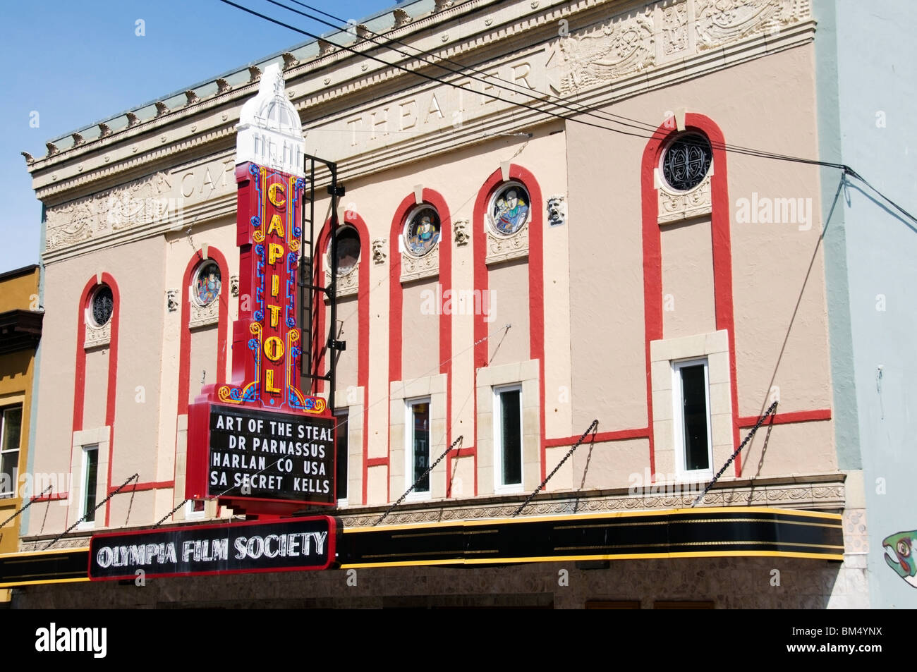 Front view of the Capitol Theater building and sign in downtown Olympia