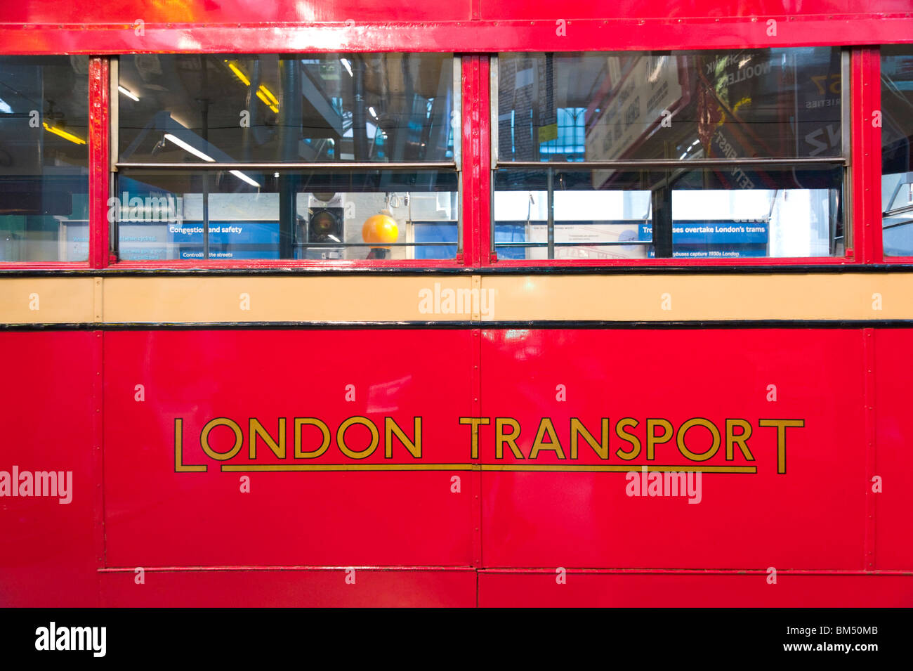 Side of bus in The London Transport Museum, England, UK Stock Photo