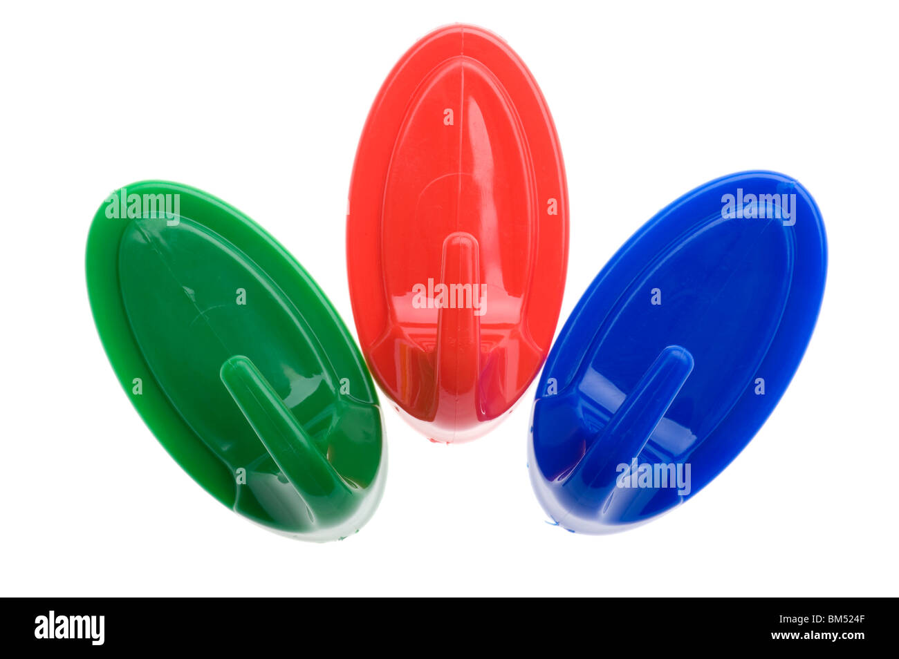 object on white - Colored plastic hook Stock Photo - Alamy