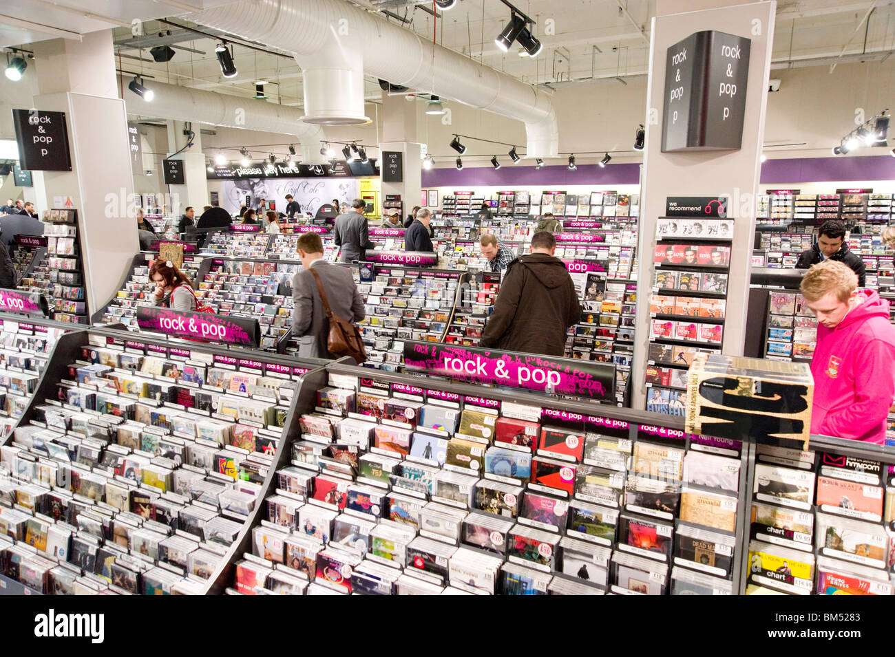 Rows of pop music CDs in HMV record shop, London, England, UK Stock Photo