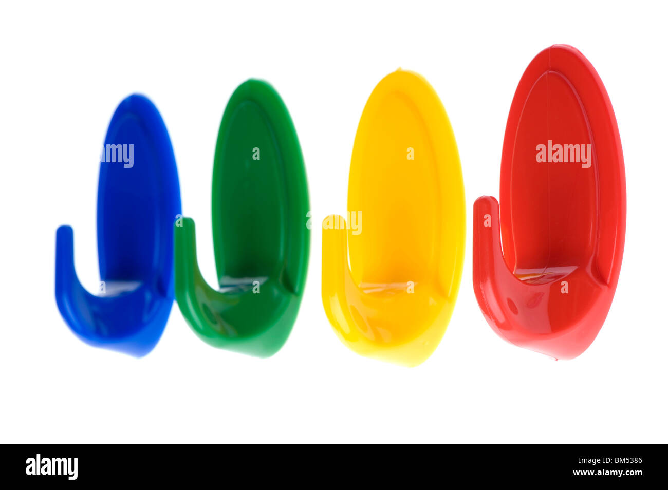 object on white - Colored plastic hook Stock Photo - Alamy