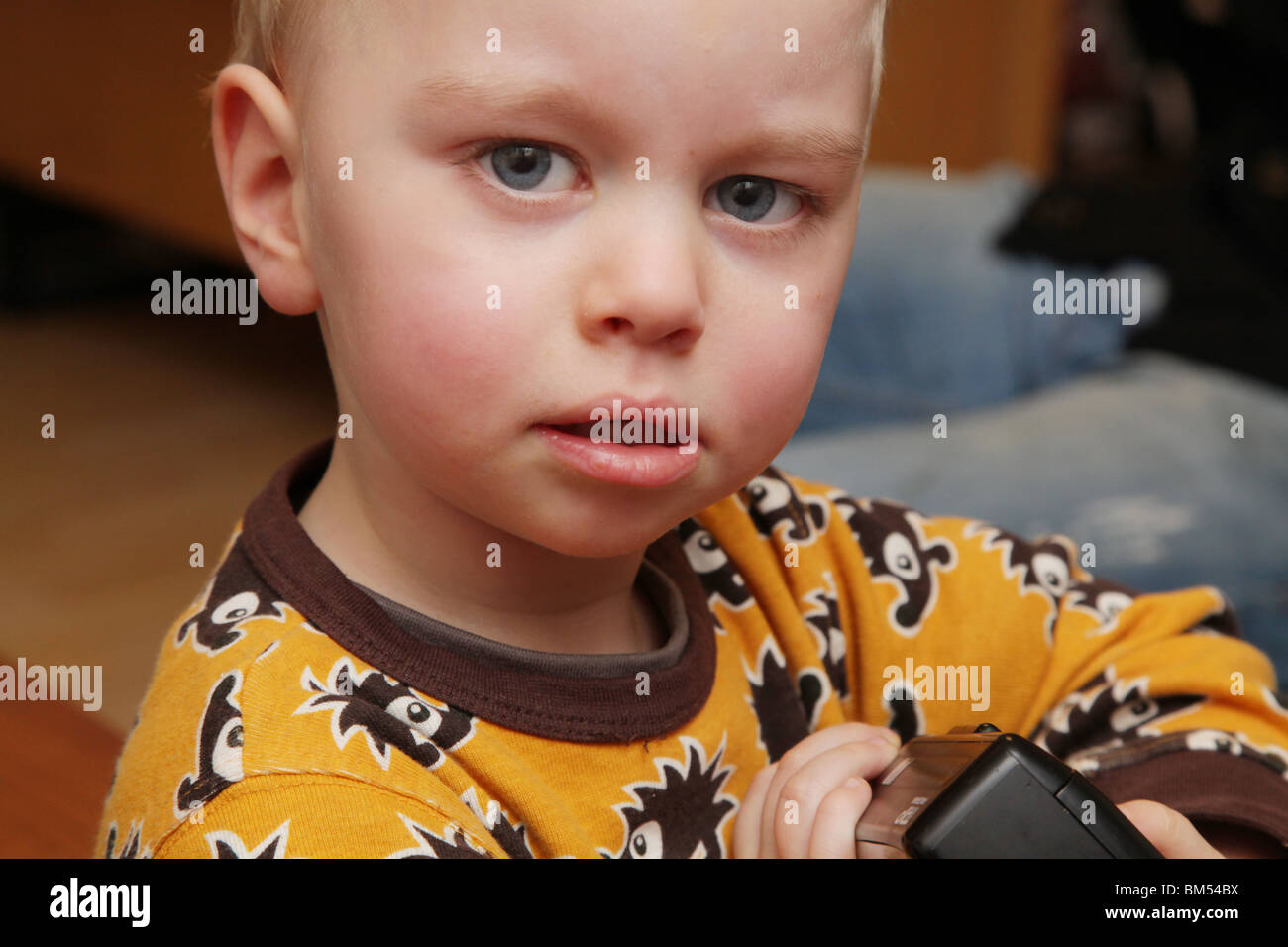 A two year old baby boy angry staring hard with attitude model released