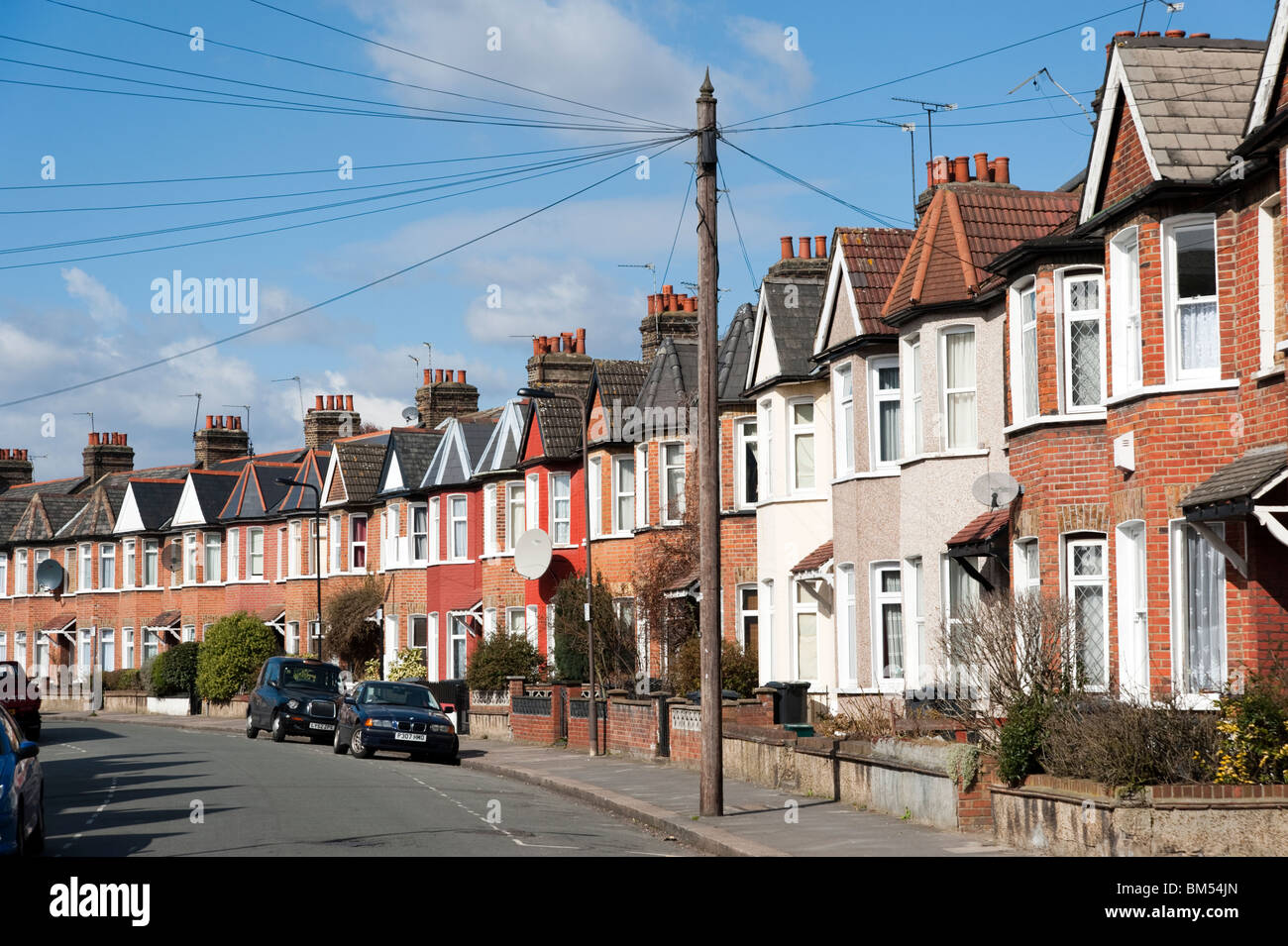 Row of terraced houses in residential Street, London, England, UK Stock Photo
