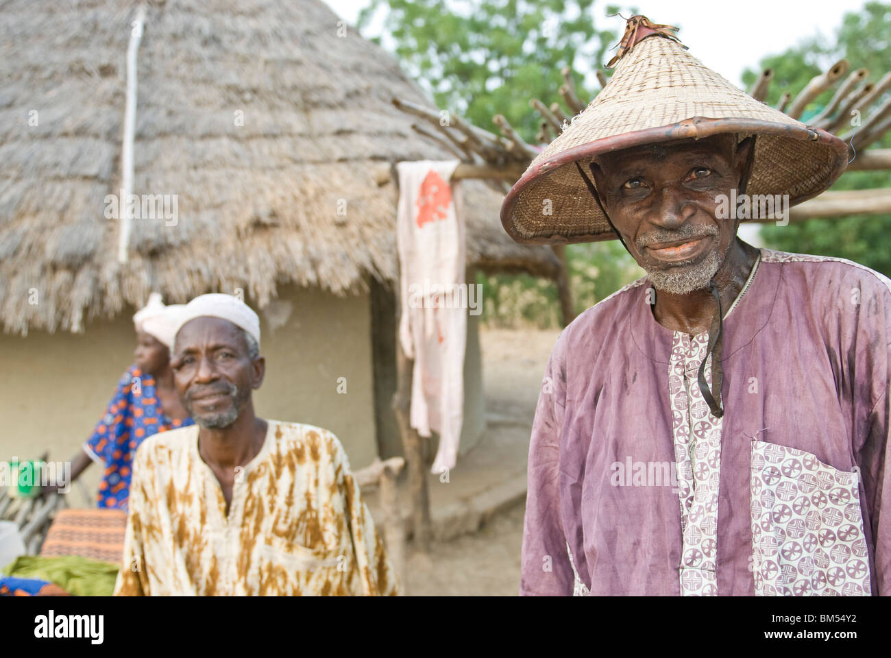 Old Bassari men looking to the camera, Village of Ibel, Bassari country, Senegal, Africa. Stock Photo