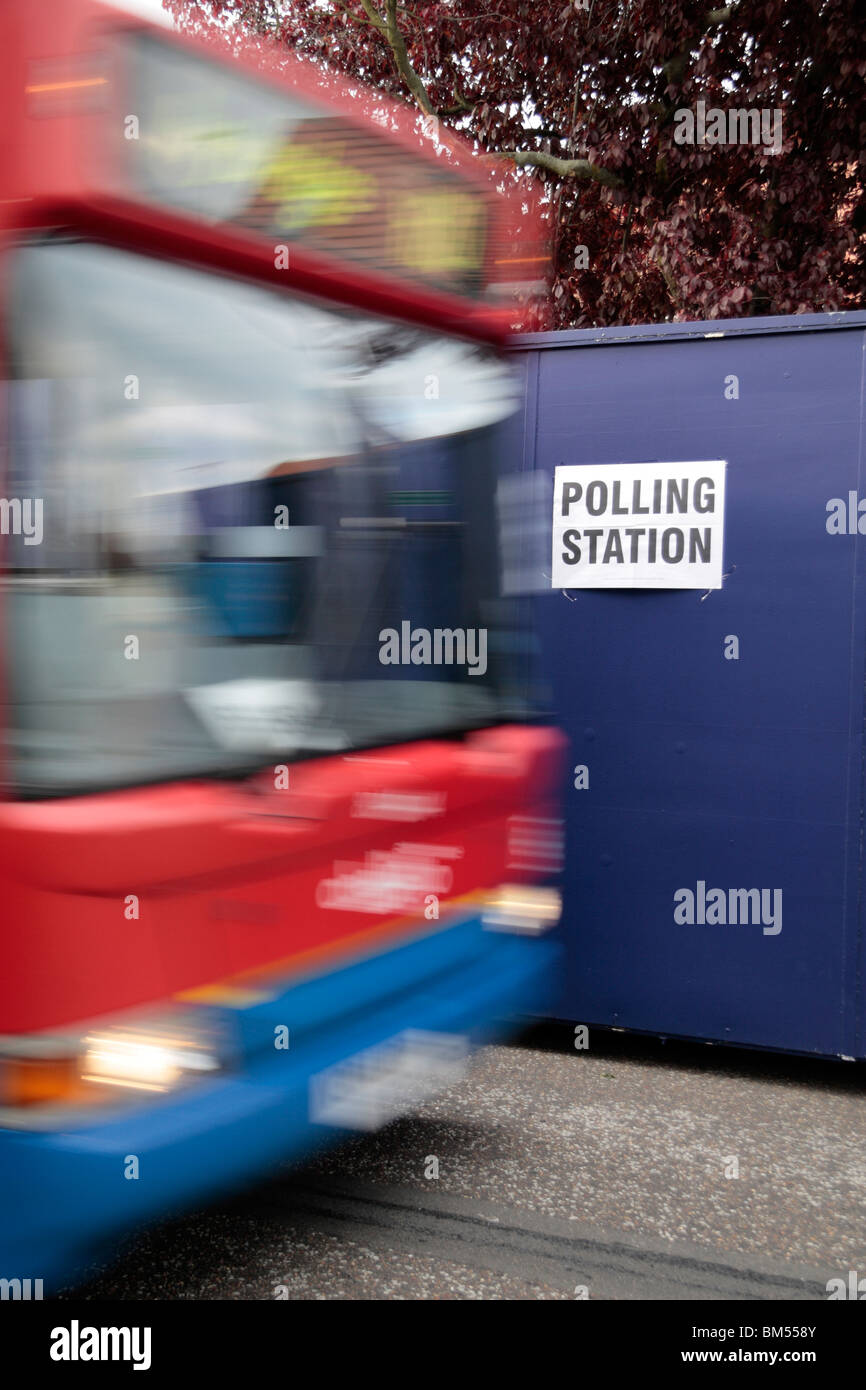 Bus passing a temporary Polling Station on a residential street in Hounslow, UK during the UK General Election. May 2010. Stock Photo