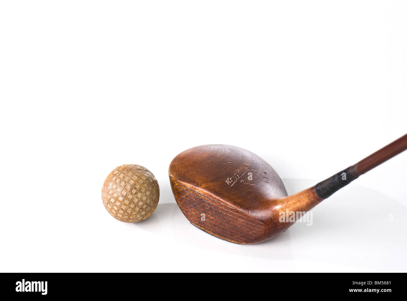 Antique golf ball and wooden driver Stock Photo Alamy