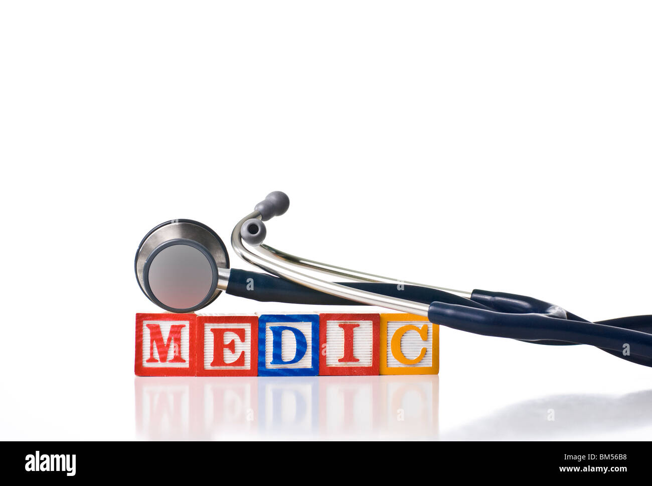 Colorful children's blocks that spell MEDIC with a stethoscope Stock Photo
