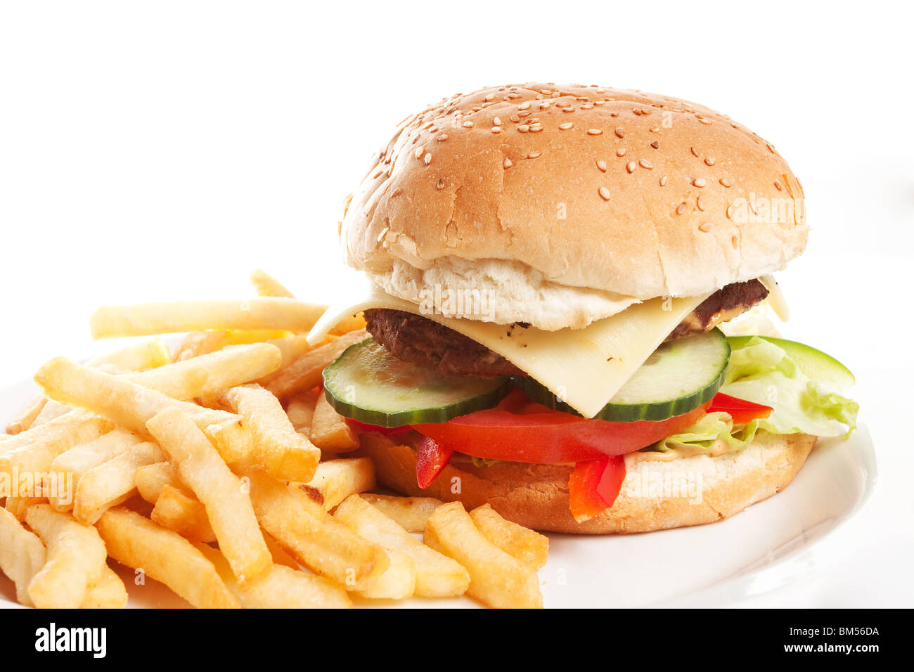 Hamburger with french fries on a dinner plate Stock Photo