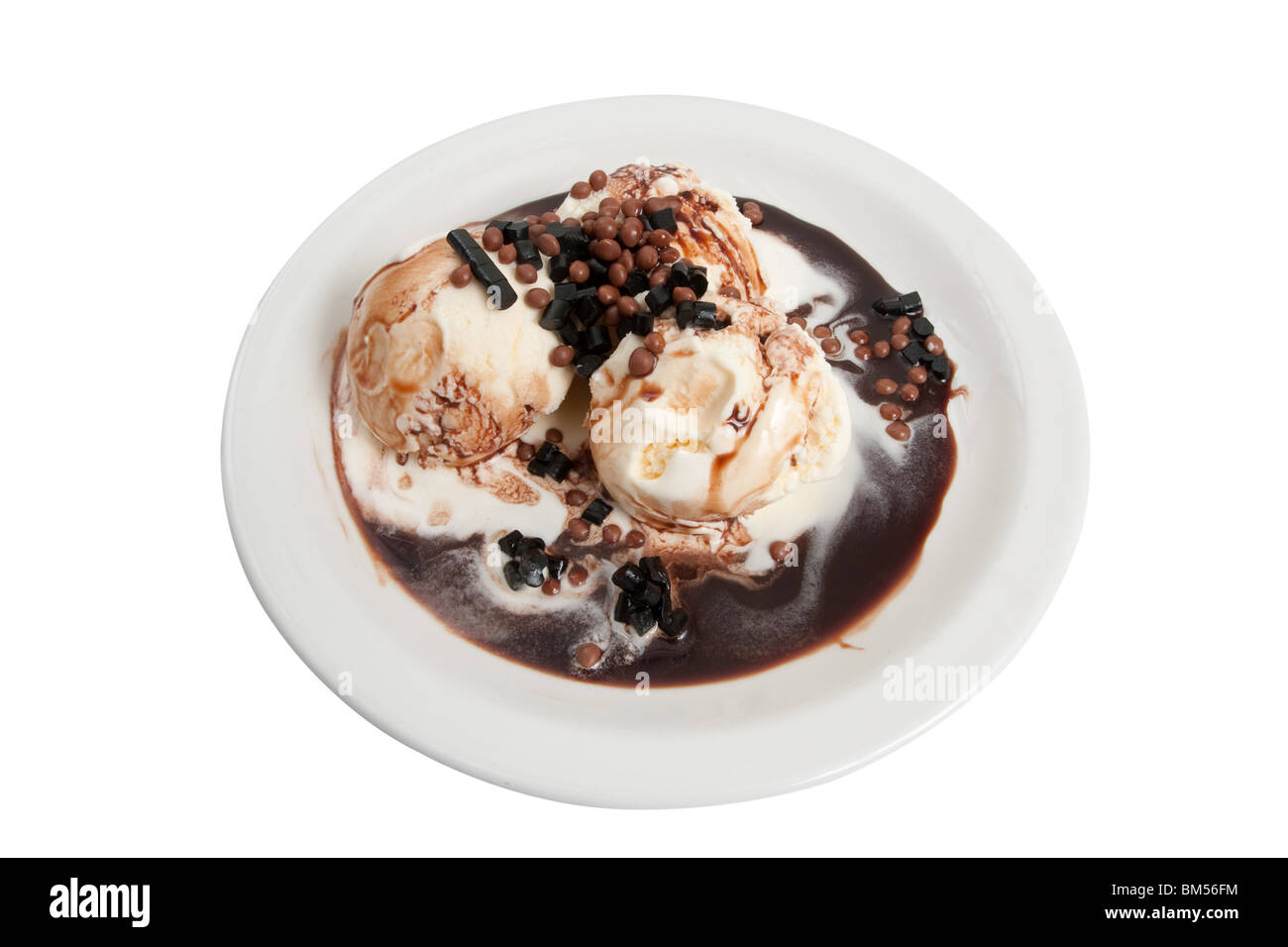 Ice cream dessert with chocolate sauce and candy topping Stock Photo