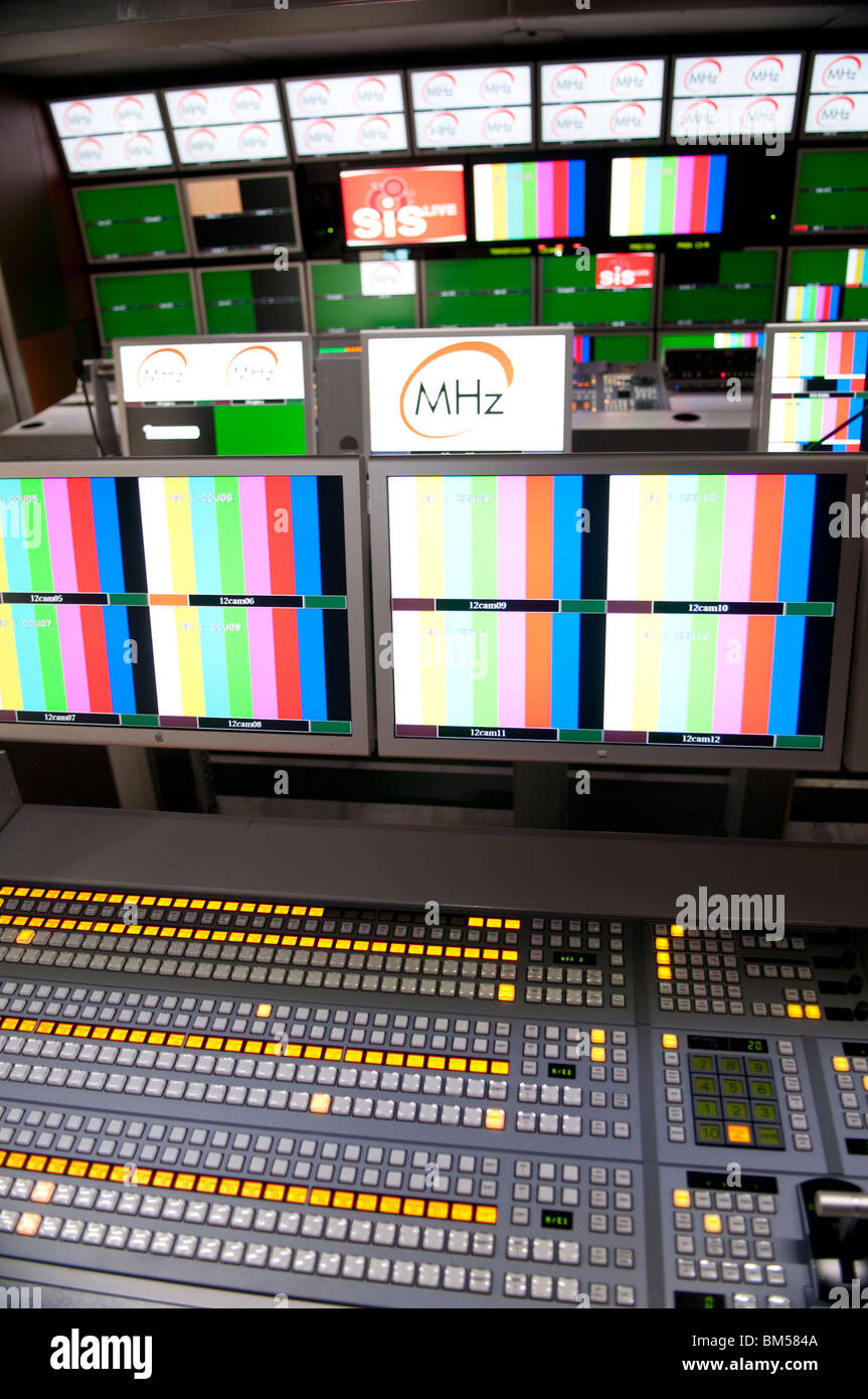 Monitor wall and vision mixer in Outside Broadcast Vehicle Stock Photo
