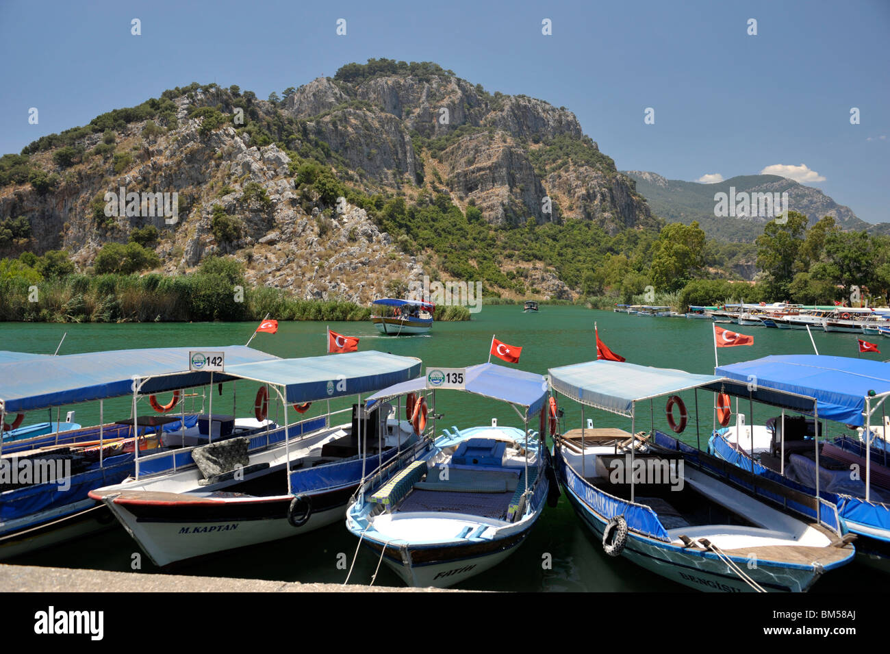 boats moored up on dalyan river dalyan turkey Stock Photo