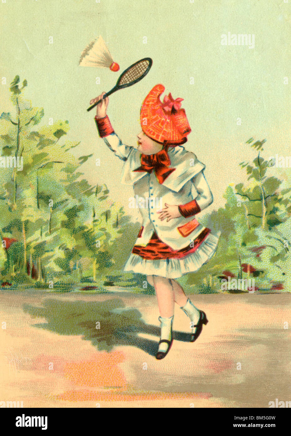 Young Girl Playing Badminton Stock Photo