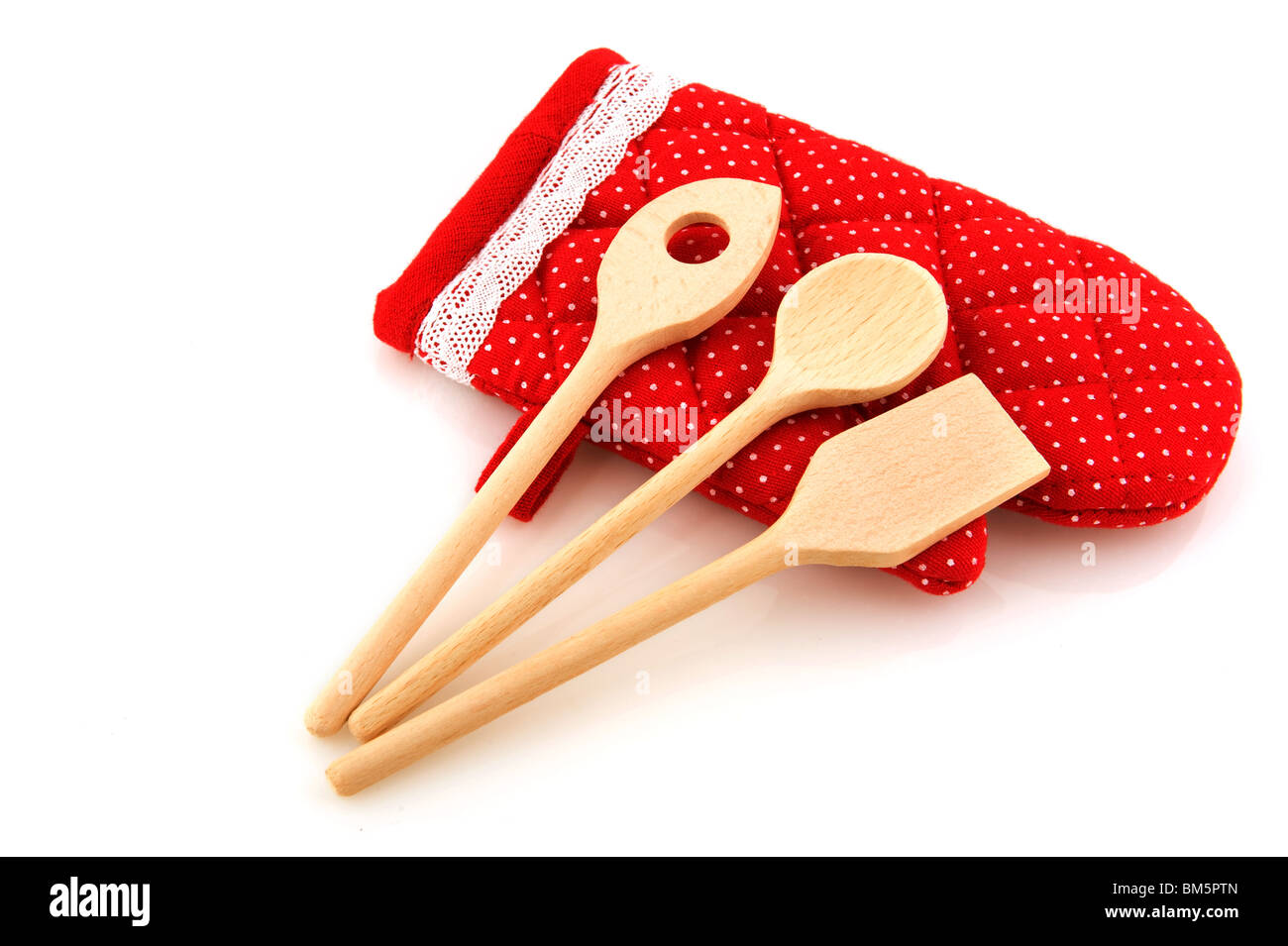 Kitchen equipment as wooden spoons and glove Stock Photo Alamy