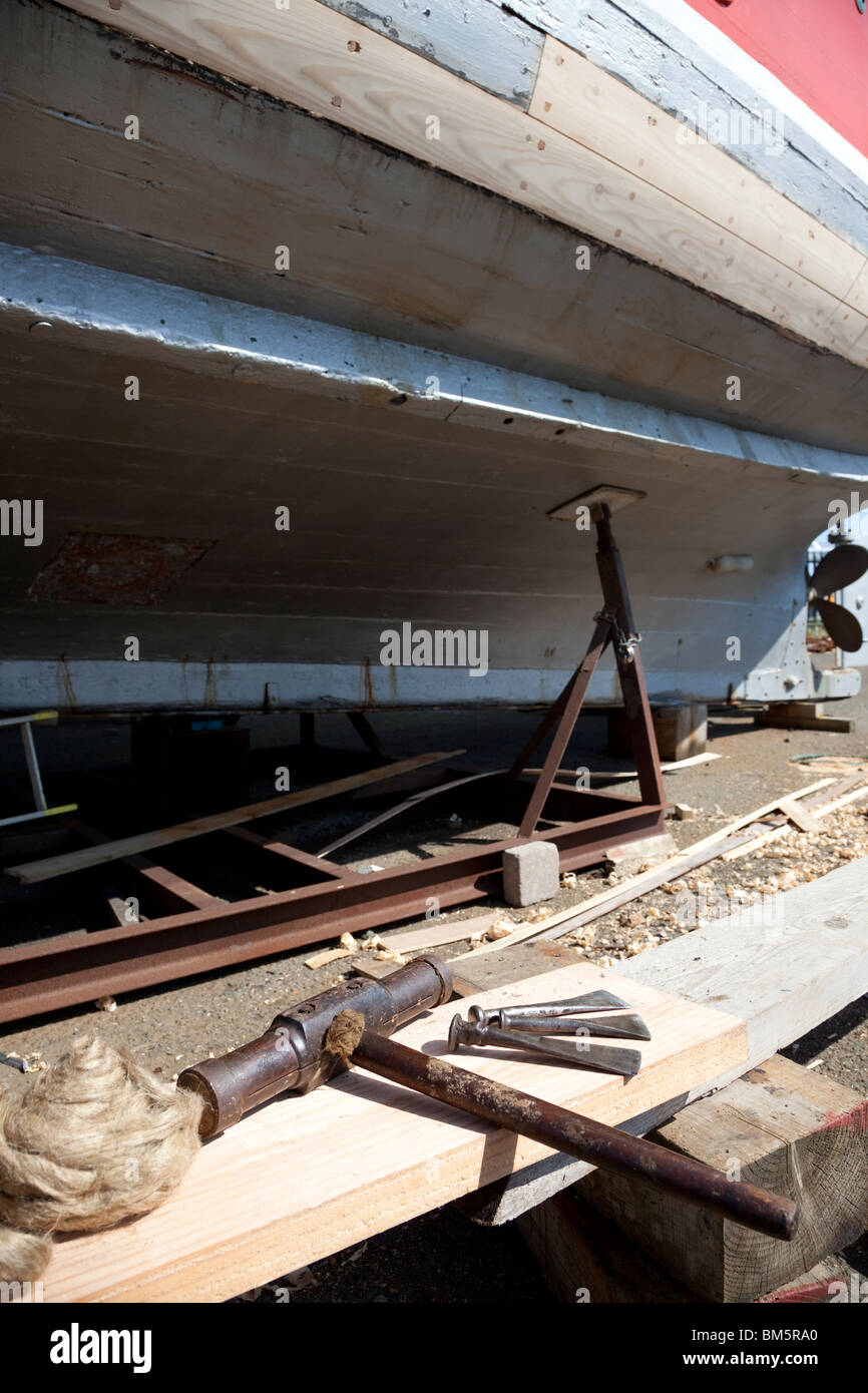 Carpentry tools of a master ship builder, including a caulking hammer