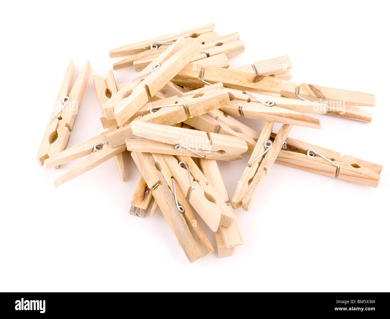 Picture of wooden pegs on white background Stock Photo - Alamy