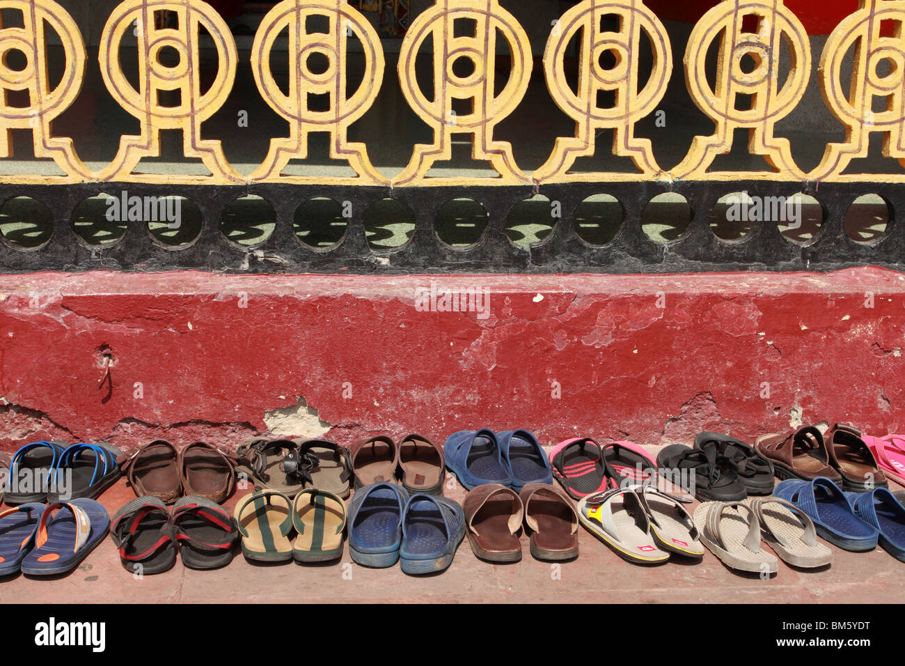 Monks sandals outside the Gompa at Rumtek, Sikkim Stock Photo