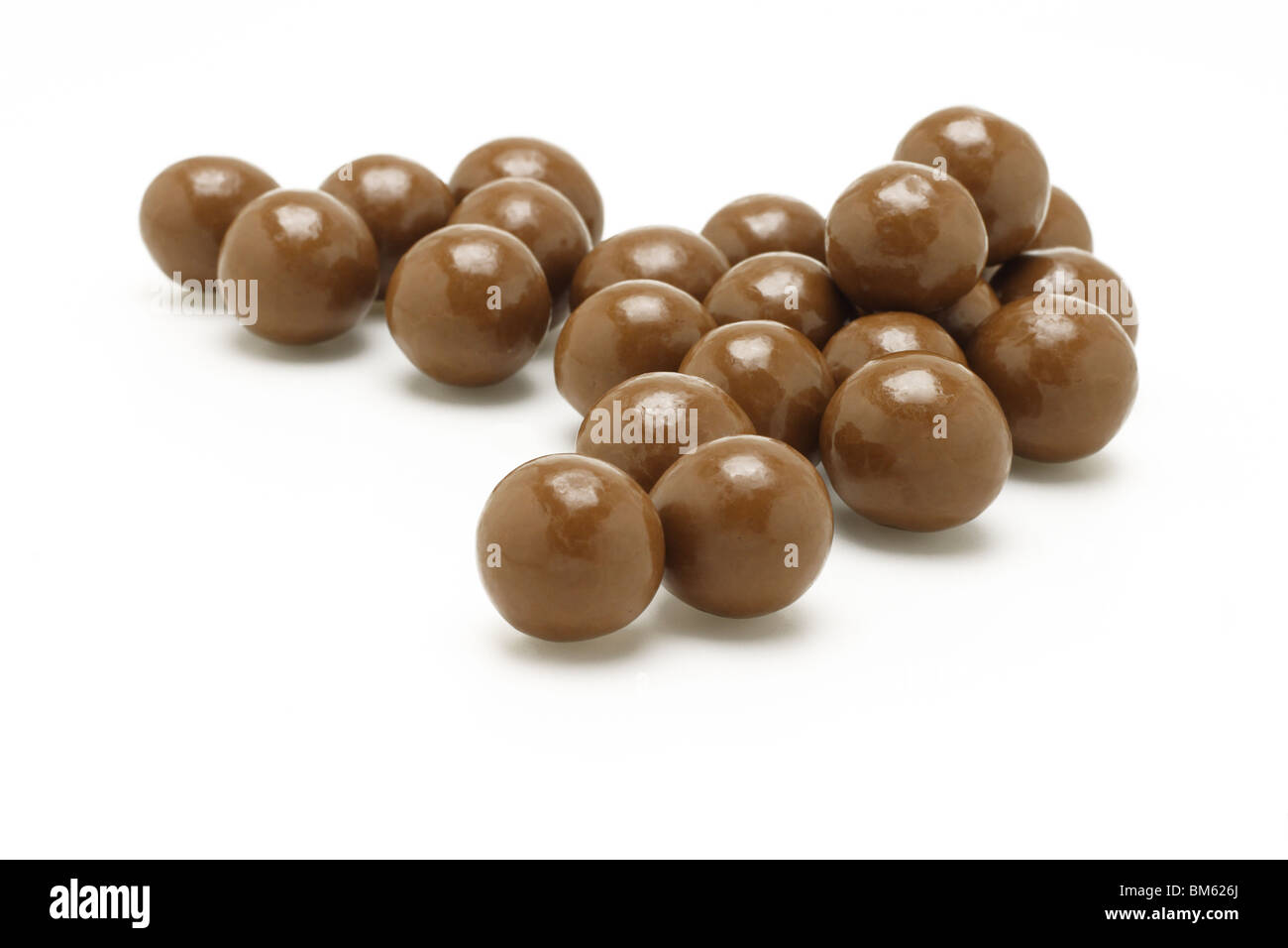Dark brown Chocolate balls on white background Stock Photo