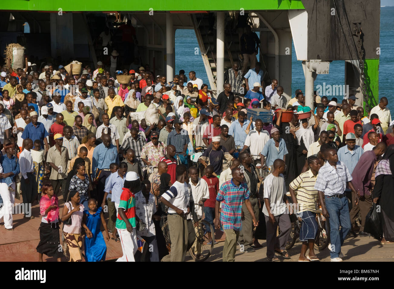 People disembarking from a ferry, Mombasa harbor, Kenya, East Africa Stock Photo