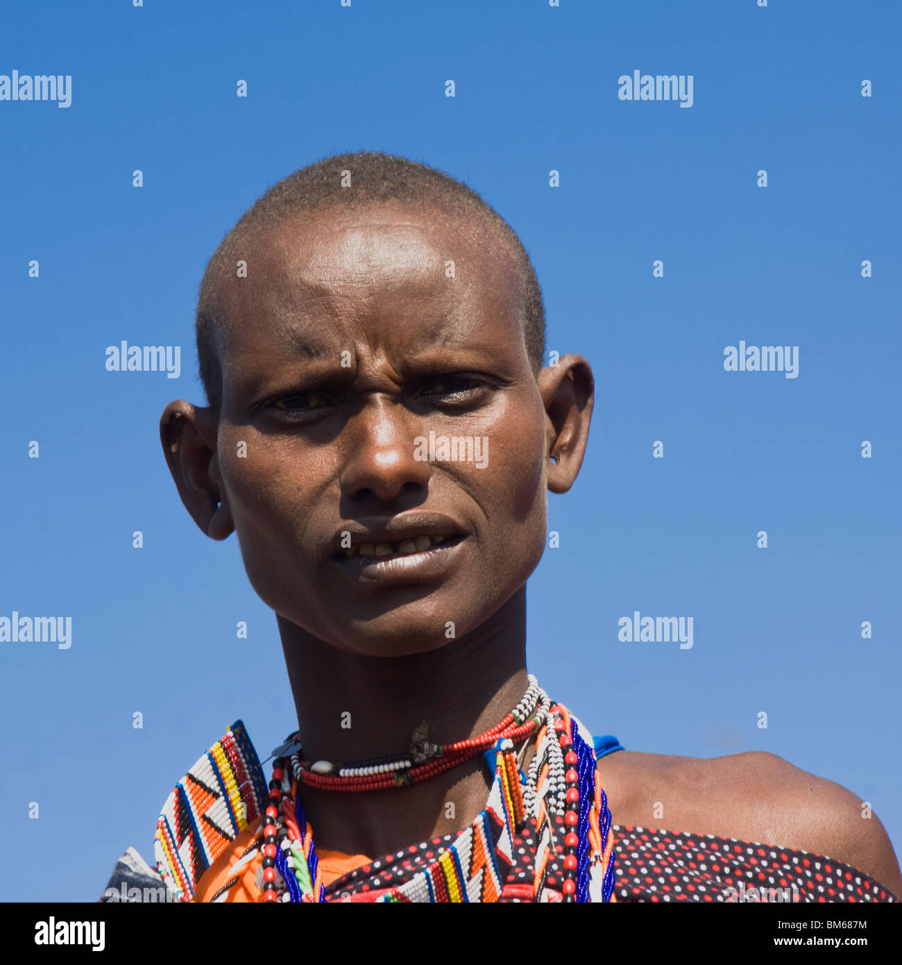 Portrait of a Masai tribeswoman; Masai Mara, Kenya, East Africa Stock Photo