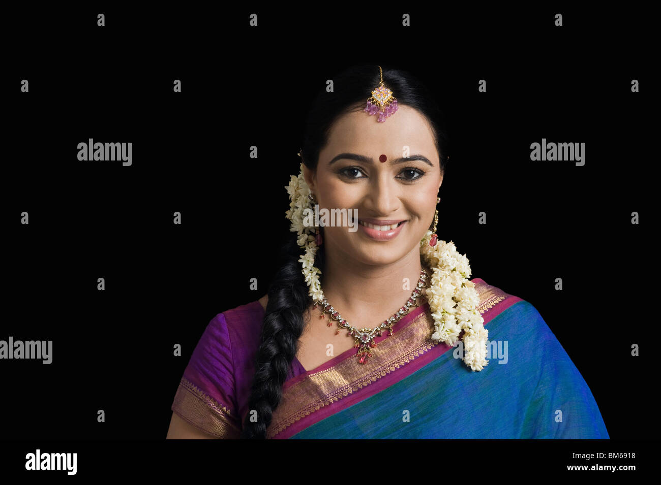 Portrait of a South Indian woman smiling Stock Photo - Alamy