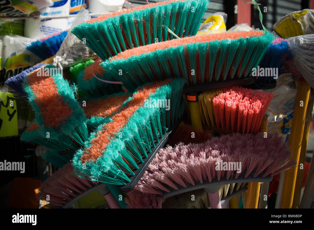 Brooms for sale outside a store in the Hell's Kitchen neighborhood of