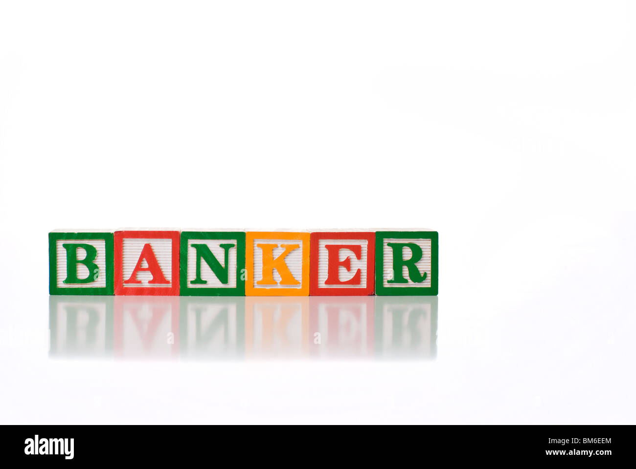 Colorful children's blocks spelling the word BANKER Stock Photo