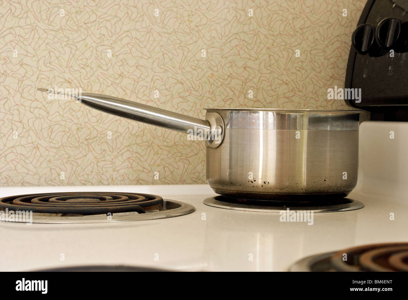 stainless steel cookware on electric stove