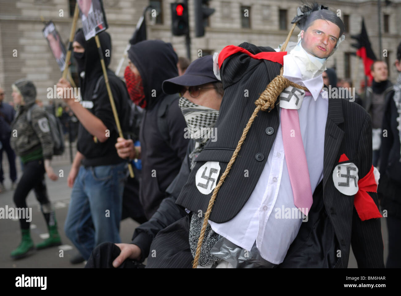 The effigy of BNP leader Nick Grriffin is dfragged through London to be hung on Parliament Square. Stock Photo