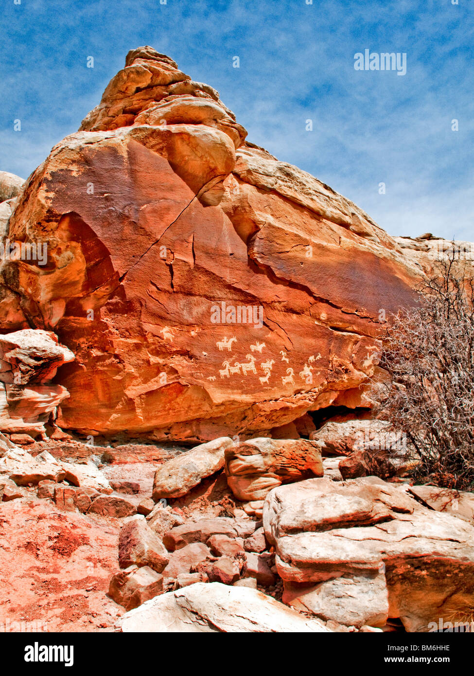 Ute Indian petroglyphs in Entrada Sandstone in Arches National Park, Utah dating from between 1650 and 1850. Stock Photo