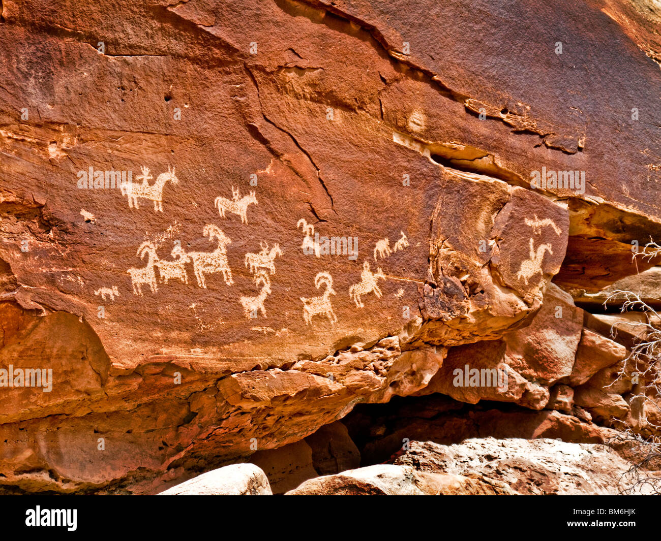 Ute Indian petroglyphs in Entrada Sandstone in Arches National Park, Utah dating from between 1650 and 1850. Stock Photo