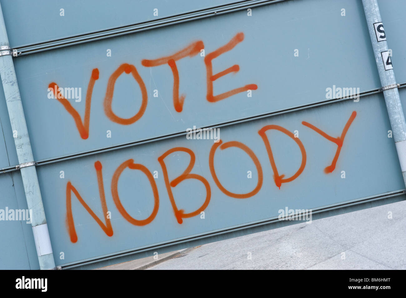 VOTE NOBODY graffiti on rear of roadsign in Cardiff South Wales UK Stock Photo