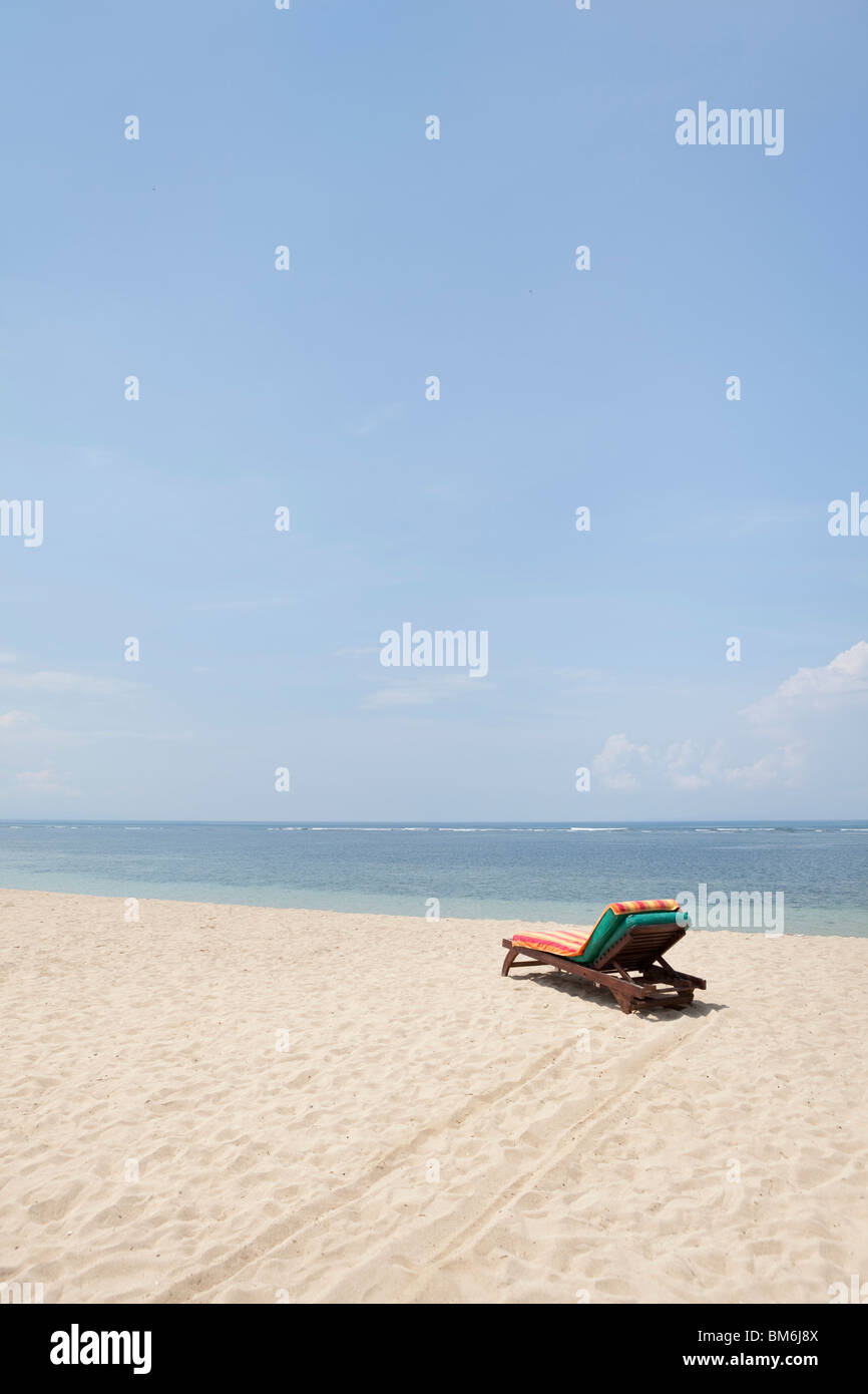 Empty sun lounger at the beach of Sanur, Bali, Indonesia Stock Photo