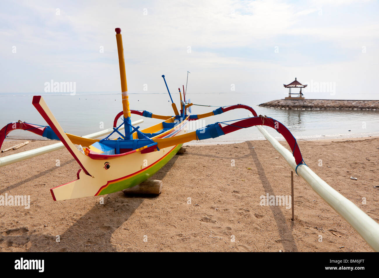 Traditional outrigger fishing boat at Sanur, Bali, Indonesia Stock Photo