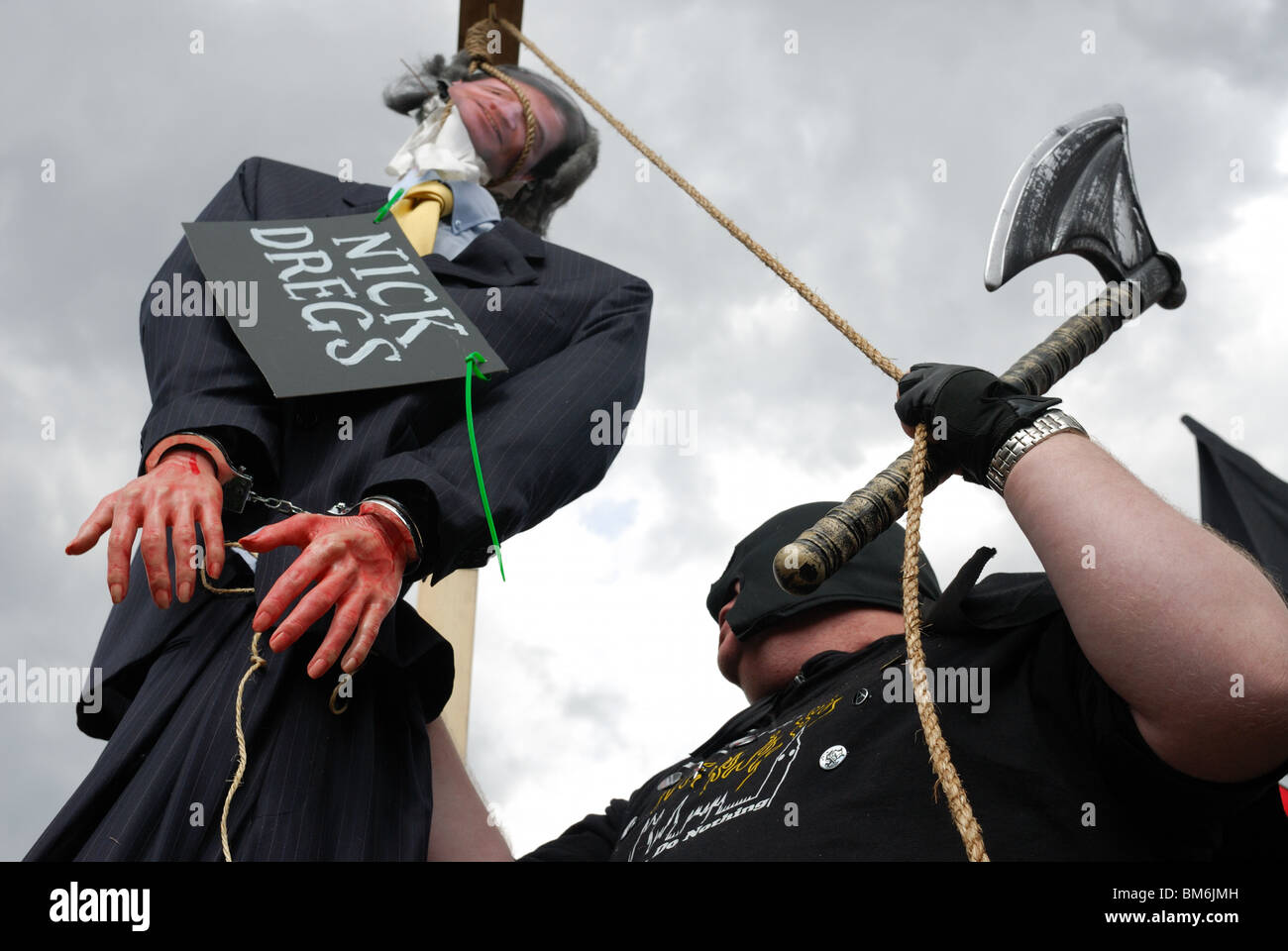 The effigy of Liberal Democrat leader Nick Clegg being hung by the executioner on Parliament Square on May Day. Stock Photo